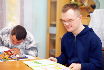 Young adult men with disability engages in self study